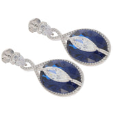 Oval blue sapphire sterling silver earrings with diamond accents, showcasing elegance and luxury.